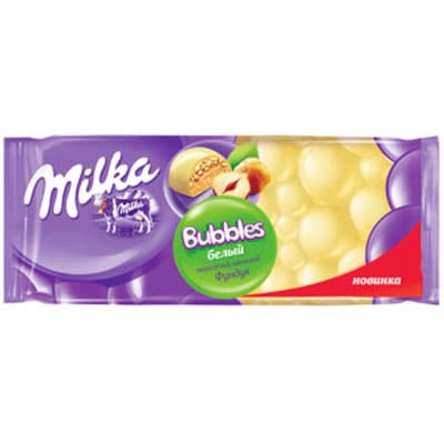 Шоколад Milka белый пористый с фундуком 83 гр
